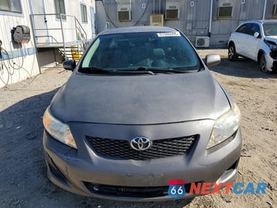 Piąte zdjęcie samochodu w środku: 2010 TOYOTA COROLLA LE VIN:JTDBU4EE6AJ077458 - miniatura