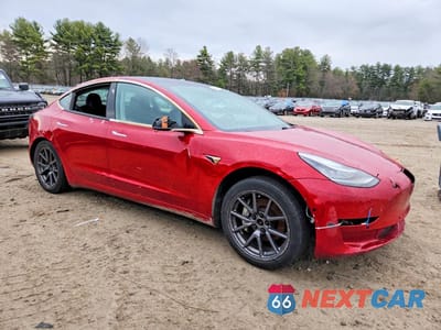 Czwarte zdjęcie samochodu z boku: 2020 TESLA MODEL 3 VIN:5YJ3E1EC3LF586464 - miniatura