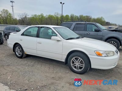 Czwarte zdjęcie samochodu z boku: 2001 TOYOTA CAMRY CE VIN:4T1BG22K91U766023 - miniatura