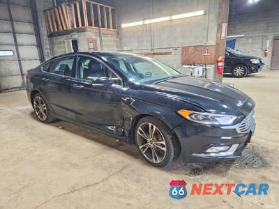 Czwarte zdjęcie samochodu z boku: 2017 FORD FUSION TITANIUM VIN:3FA6P0D97HR184093 - miniatura