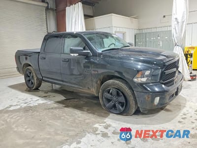 Czwarte zdjęcie samochodu z boku: 2018 RAM 1500 SLT VIN:1C6RR7LT3JS114275 - miniatura