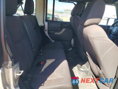 Zdjęcie 10 z 12 samochodu: 2014 JEEP WRANGLER UNLIMITED SPORT VIN:1C4BJWDG9EL260578 - miniatura