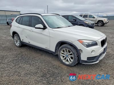 Czwarte zdjęcie samochodu z boku: 2015 BMW X1 XDRIVE28I VIN:WBAVL1C55FVY41167 - miniatura