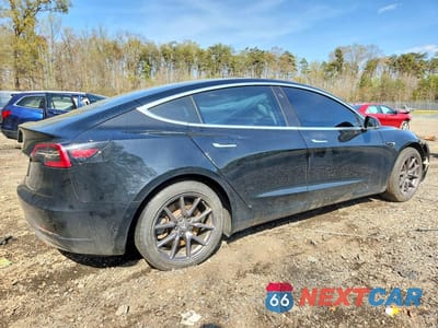 Trzecie zdjęcie samochodu z tyłu: 2019 TESLA MODEL 3 VIN:5YJ3E1EA9KF301702 - miniatura