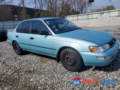 Czwarte zdjęcie samochodu z boku: 1994 TOYOTA COROLLA DX VIN:1NXAE09B1RZ183033 - miniatura