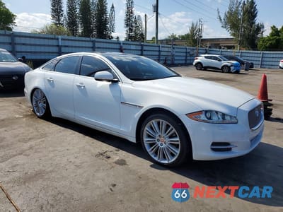 Czwarte zdjęcie samochodu z boku: 2014 JAGUAR XJ VIN:SAJWA1CZ0E8V71540 - miniatura