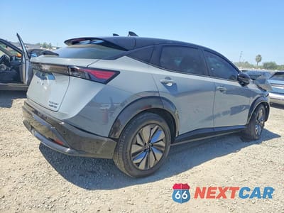 Trzecie zdjęcie samochodu z tyłu: 2024 NISSAN ARIYA PLATINUM+ E-4ORCE VIN:JN1DF0CD0RM734421 - miniatura