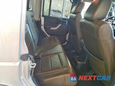 Zdjęcie 10 z 12 samochodu: 2011 JEEP WRANGER VIN:1J4HA7H1XBL612921 - miniatura