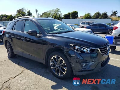 Czwarte zdjęcie samochodu z boku: 2016 MAZDA CX-5 GT VIN:JM3KE4DY9G0845142 - miniatura