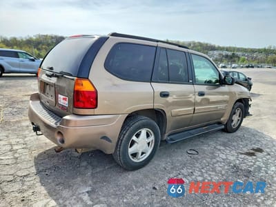 Trzecie zdjęcie samochodu z tyłu: 2003 GMC ENVOY VIN:1GKDT13S432103429 - miniatura