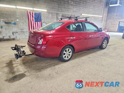 Trzecie zdjęcie samochodu z tyłu: 2012 NISSAN VERSA 1.6 S VIN:3N1CN7AP2CL805477 - miniatura