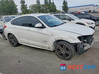 Czwarte zdjęcie samochodu z boku: 2015 BMW X4 XDRIVE35I VIN:5UXXW5C59F0E87713 - miniatura