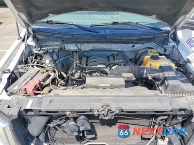 Zdjęcie 11 z 12 samochodu: 2014 FORD F150 VIN:1FTNF1CF9EKD48188 - miniatura