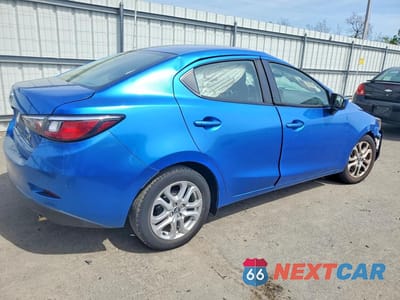 Trzecie zdjęcie samochodu z tyłu: 2017 TOYOTA YARIS IA BASE VIN:3MYDLBYV4HY175424 - miniatura