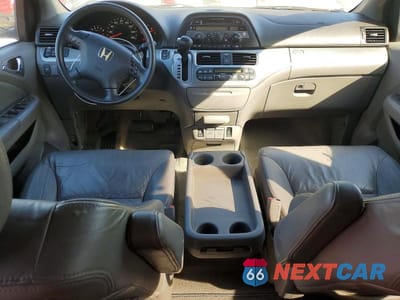 Zdjęcie 8 z 14 samochodu: 2010 HONDA ODYSSEY EXL VIN:5FNRL3H6XAB038458 - miniatura