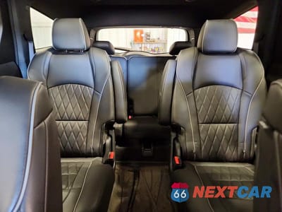 Zdjęcie 10 z 13 samochodu: 2023 BUICK ENCLAVE AVENIR VIN:5GAEVCKW9PJ128995 - miniatura