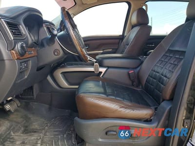 Zdjęcie 7 z 12 samochodu: 2017 NISSAN TITAN XD PLATINUM RESERVE VIN:1N6BA1F42HN561043 - miniatura