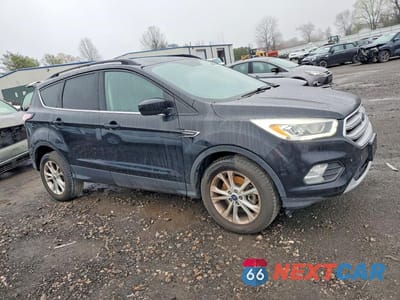 Czwarte zdjęcie samochodu z boku: 2017 FORD ESCAPE SE VIN:1FMCU0G97HUE46961 - miniatura
