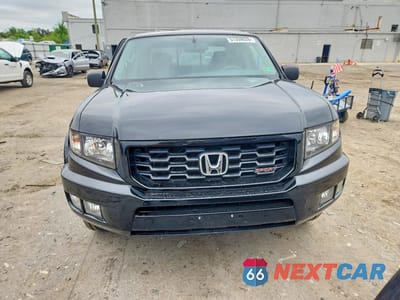 Piąte zdjęcie samochodu w środku: 2013 HONDA RIDGELINE SPORT VIN:5FPYK1F75DB018869 - miniatura
