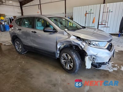 Czwarte zdjęcie samochodu z boku: 2017 HONDA CR-V LX VIN:5J6RW6H35HL003603 - miniatura