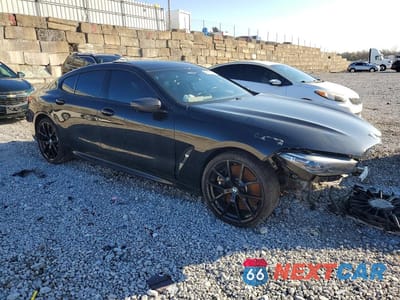 Czwarte zdjęcie samochodu z boku: 2022 BMW M850XI VIN:WBAGV8C02NCK08667 - miniatura