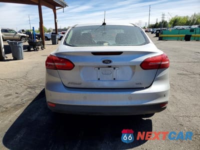 Zdjęcie 6 z 12 samochodu: 2017 FORD FOCUS SEL VIN:1FADP3H28HL258013 - miniatura