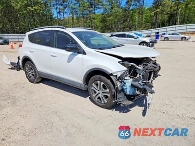 Czwarte zdjęcie samochodu z boku: 2018 TOYOTA RAV4 LE VIN:2T3ZFREV2JW429376 - miniatura