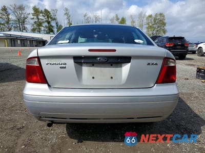 Zdjęcie 6 z 13 samochodu: 2005 FORD FOCUS ZX4 VIN:1FAFP34N15W238270 - miniatura