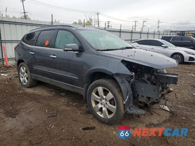 Czwarte zdjęcie samochodu z boku: 2010 CHEVROLET TRAVERSE LTZ VIN:1GNLRHED9AS126786 - miniatura