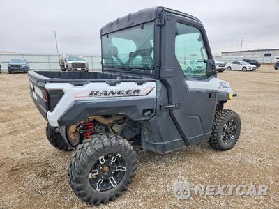Czwarte zdjęcie samochodu z boku: 2021 POLARIS RANGER XP 1000 UTILITY VEHICLE VIN:4XARRU993M8457583 - miniatura