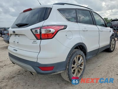 Trzecie zdjęcie samochodu z tyłu: 2017 FORD ESCAPE SE VIN:1FMCU0GD0HUA60869 - miniatura
