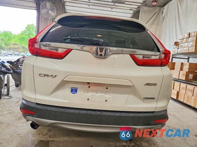 Zdjęcie 6 z 13 samochodu: 2017 HONDA CR-V TOURING VIN:2HKRW2H91HH650118 - miniatura