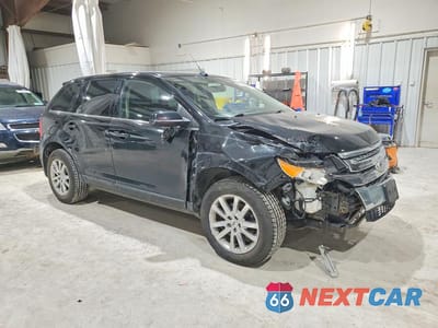 Czwarte zdjęcie samochodu z boku: 2011 FORD EDGE LIMITED VIN:2FMDK4KC0BBB29122 - miniatura