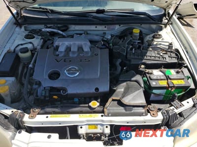 Zdjęcie 11 z 12 samochodu: 2003 NISSAN MAXIMA GXE VIN:JN1DA31D83T517621 - miniatura