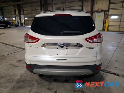 Zdjęcie 6 z 13 samochodu: 2014 FORD ESCAPE TITANIUM VIN:1FMCU9J98EUA73034 - miniatura