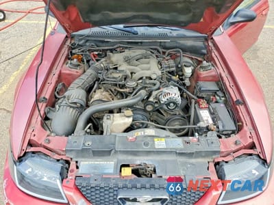 Zdjęcie 11 z 12 samochodu: 2002 FORD MUSTANG VIN:1FAFP40462F102084 - miniatura