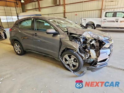 Czwarte zdjęcie samochodu z boku: 2016 HONDA HR-V LX VIN:3CZRU6H30GM708862 - miniatura
