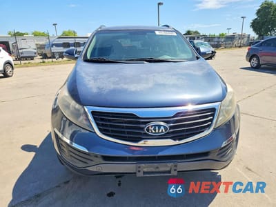 Piąte zdjęcie samochodu w środku: 2012 KIA SPORTAGE LX VIN:KNDPB3A2XC7210501 - miniatura