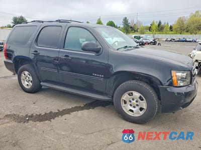 Czwarte zdjęcie samochodu z boku: 2014 CHEVROLET TAHOE K1500 LT VIN:1GNSKBE06ER229252 - miniatura
