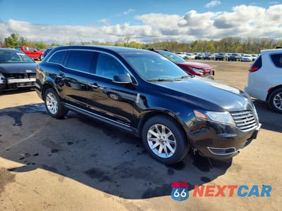 Czwarte zdjęcie samochodu z boku: 2018 LINCOLN MKT VIN:2LMHJ5NK5JBL02598 - miniatura