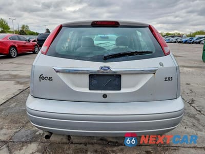 Zdjęcie 6 z 12 samochodu: 2002 FORD FOCUS ZX5 VIN:3FAHP373X2R192018 - miniatura