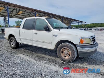 Czwarte zdjęcie samochodu z boku: 2003 FORD F150 SUPERCREW VIN:1FTRW07L13KA73957 - miniatura