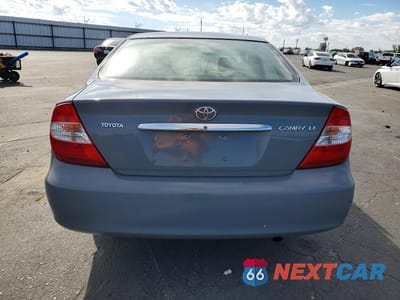 Zdjęcie 6 z 12 samochodu: 2003 TOYOTA CAMRY LE VIN:JTDBE32K730146698 - miniatura