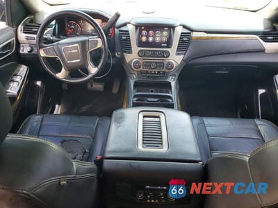 Zdjęcie 8 z 13 samochodu: 2016 GMC YUKON DENALI VIN:1GKS2CKJ6GR397492 - miniatura