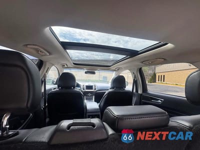 Zdjęcie 9 z 10 samochodu: 2019 FORD EDGE TITANIUM VIN:2FMPK3K97KBC02479 - miniatura