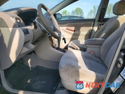 Zdjęcie 7 z 11 samochodu: 2005 TOYOTA COROLLA LE VIN:1NXBR32E45Z399712 - miniatura