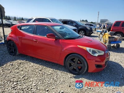 Czwarte zdjęcie samochodu z boku: 2013 HYUNDAI VELOSTER BASE VIN:KMHTC6AD2DU169746 - miniatura
