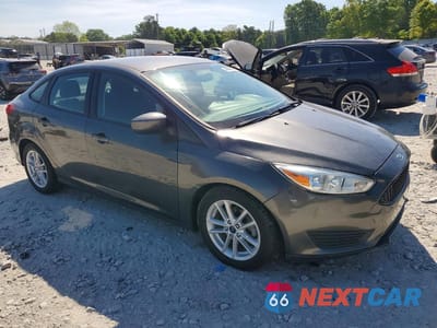 Czwarte zdjęcie samochodu z boku: 2018 FORD FOCUS SE VIN:1FADP3F23JL207320 - miniatura