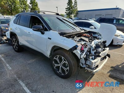 Czwarte zdjęcie samochodu z boku: 2021 TOYOTA RAV4 PRIME XSE VIN:JTMFB3FV7MD012332 - miniatura
