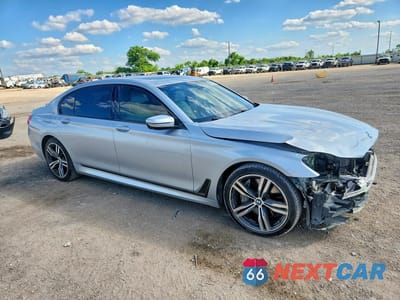 Czwarte zdjęcie samochodu z boku: 2019 BMW 750 I VIN:WBA7F0C5XKGM24801 - miniatura
